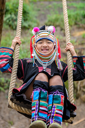 Akha girl and swing