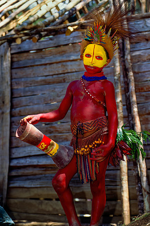 Young boy with Kundu drum