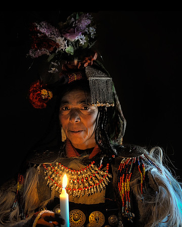 Drokpa lady and candle