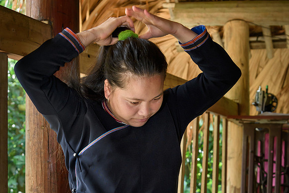 Tying Her Hair